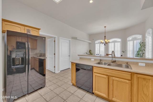 787 Maxey Marie Dr, El Paso, TX 79932 - kitchen with black dishwasher, refrigerator with ice dispenser, light countertops, a chandelier, and light tile patterned floors