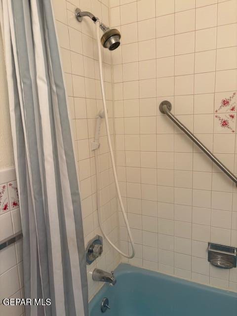 10700 Janway Dr, El Paso, TX 79935 - bathroom with shower / bath combo with shower curtain
