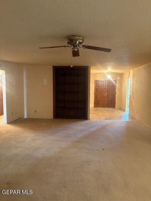 10700 Janway Dr, El Paso, TX 79935 - garage featuring a ceiling fan
