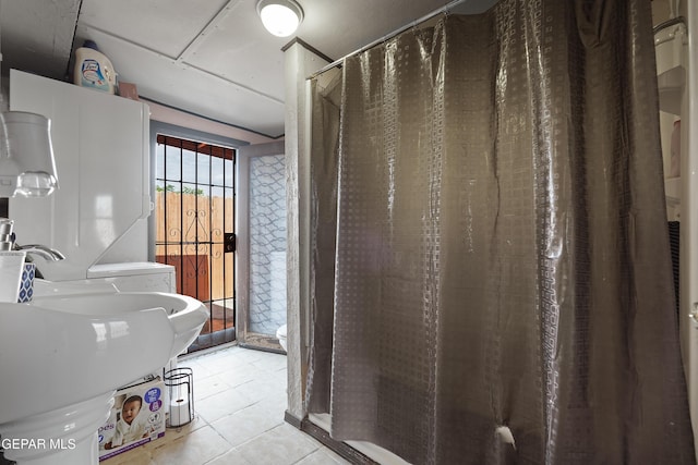 204 Ruth St, Anthony, NM 88021 - bathroom featuring a stall shower and tile patterned floors