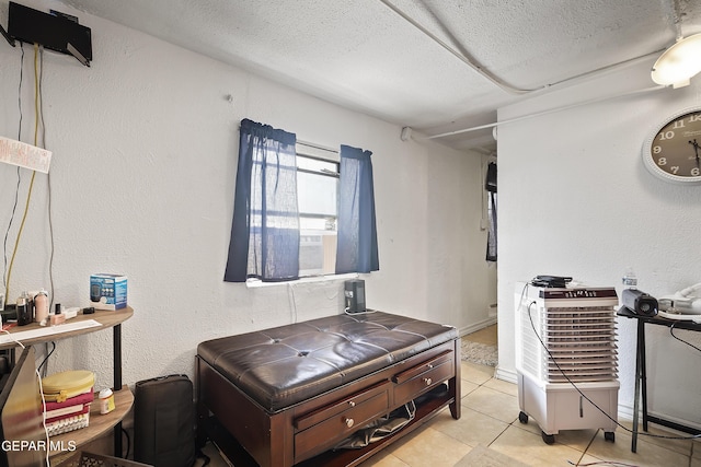 204 Ruth St, Anthony, NM 88021 - miscellaneous room featuring a textured ceiling and light tile patterned floors