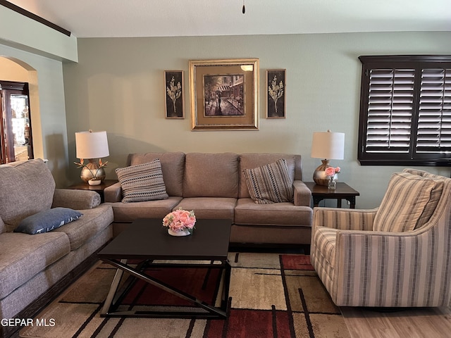 11128 Colbert Coldwell Ln, Socorro, TX 79927 - living room with arched walkways and wood finished floors