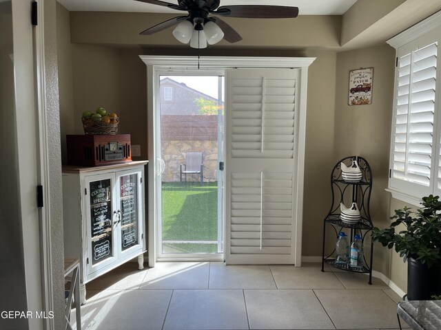 11128 Colbert Coldwell Ln, Socorro, TX 79927 - doorway to outside with tile patterned flooring and a ceiling fan