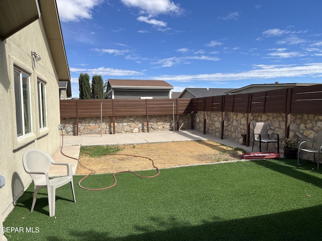 11128 Colbert Coldwell Ln, Socorro, TX 79927 - fenced backyard with a patio area