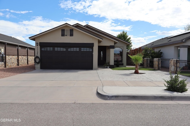 11128 Colbert Coldwell Ln, Socorro, TX 79927 - single story home featuring driveway, stucco siding, and an attached garage