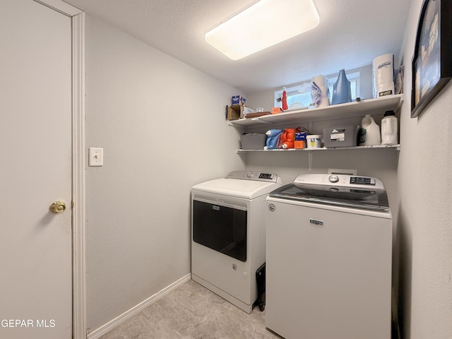 14177 Spanish Point Dr, El Paso, TX 79938 - laundry area featuring washer and dryer and baseboards