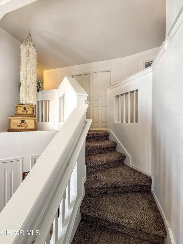 14177 Spanish Point Dr, El Paso, TX 79938 - staircase featuring carpet flooring