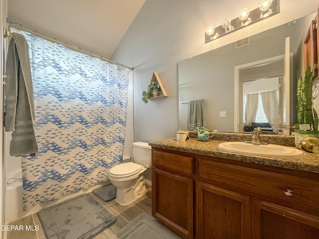 14177 Spanish Point Dr, El Paso, TX 79938 - full bathroom with vanity, curtained shower, and lofted ceiling