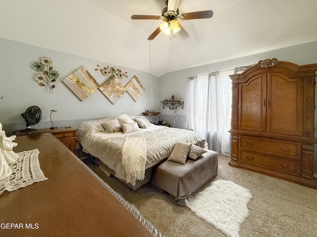 14177 Spanish Point Dr, El Paso, TX 79938 - bedroom with lofted ceiling, light colored carpet, and a ceiling fan