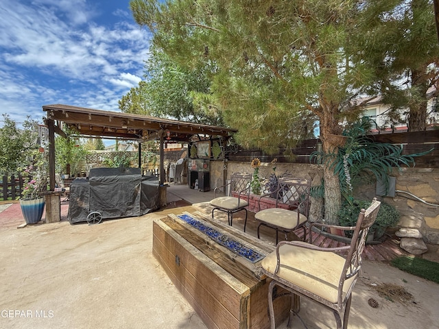 14177 Spanish Point Dr, El Paso, TX 79938 - view of patio / terrace featuring an outdoor fire pit and grilling area