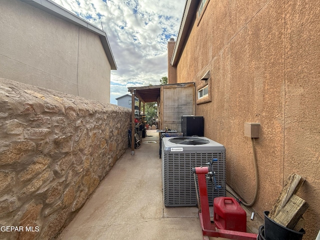 14177 Spanish Point Dr, El Paso, TX 79938 - view of property exterior with a cooling unit and stucco siding