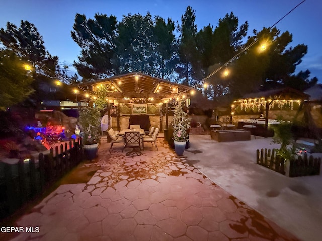 14177 Spanish Point Dr, El Paso, TX 79938 - patio at twilight with a patio area and outdoor dining space