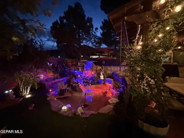 14177 Spanish Point Dr, El Paso, TX 79938 - view of yard at twilight
