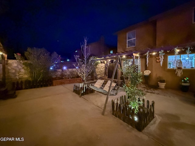 14177 Spanish Point Dr, El Paso, TX 79938 - patio at night with a patio area