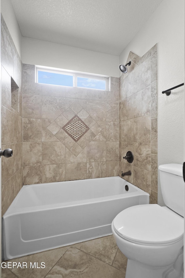 12326 Westbury, El Paso, TX 79928 - bathroom with a textured ceiling, plenty of natural light, and shower / bath combination