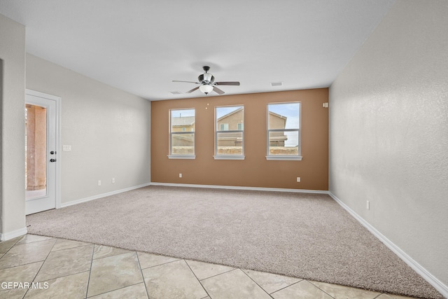 12326 Westbury, El Paso, TX 79928 - spare room with light colored carpet, a ceiling fan, and light tile patterned flooring