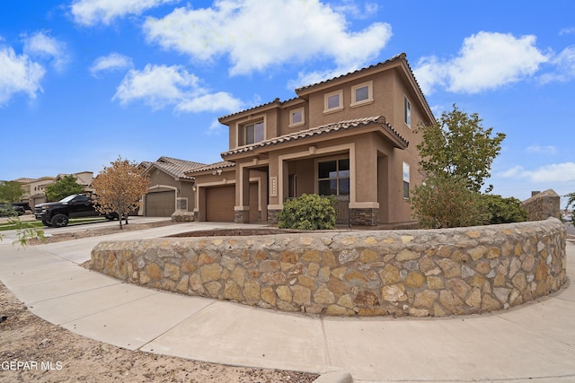 12326 Westbury, El Paso, TX 79928 - mediterranean / spanish-style home featuring stucco siding, driveway, a tile roof, and an attached garage