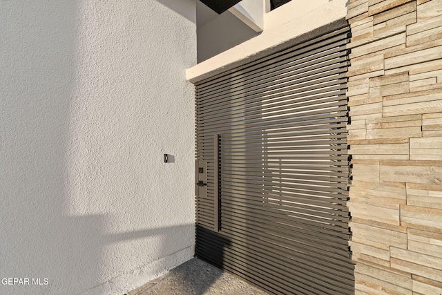 7349 Cimarron Rim Dr, El Paso, TX 79911 - detailed view of stone siding and stucco siding