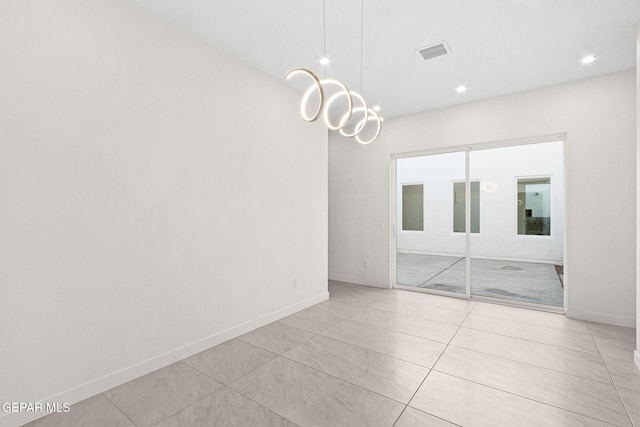7349 Cimarron Rim Dr, El Paso, TX 79911 - unfurnished room featuring recessed lighting, light tile patterned flooring, and a chandelier