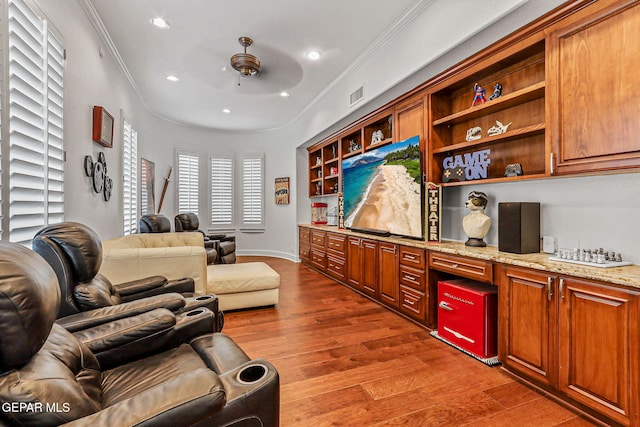 6528 Calle Placido Dr, El Paso, TX 79912 - living room featuring crown molding, wood finished floors, ceiling fan, and recessed lighting