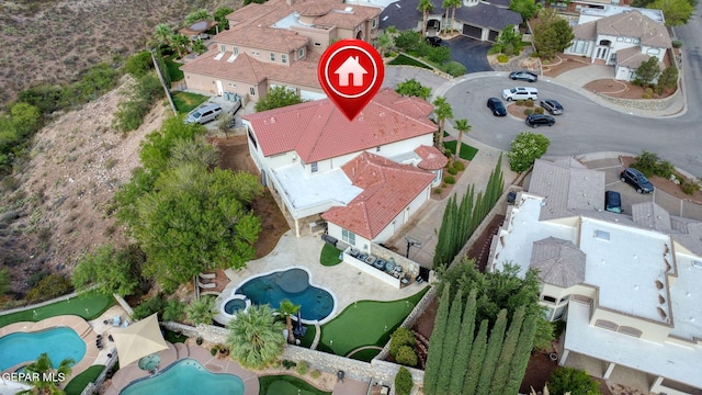 6528 Calle Placido Dr, El Paso, TX 79912 - aerial perspective of suburban area featuring a pool