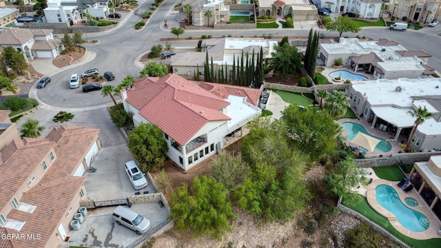 6528 Calle Placido Dr, El Paso, TX 79912 - aerial perspective of suburban area featuring a pool