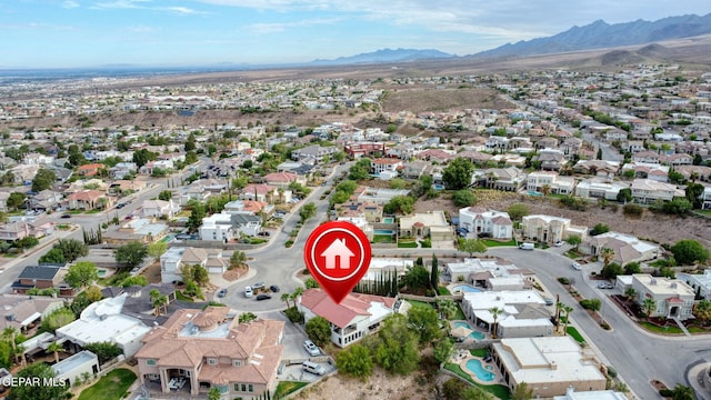 6528 Calle Placido Dr, El Paso, TX 79912 - aerial view of property and surrounding area with nearby suburban area and a mountainous background