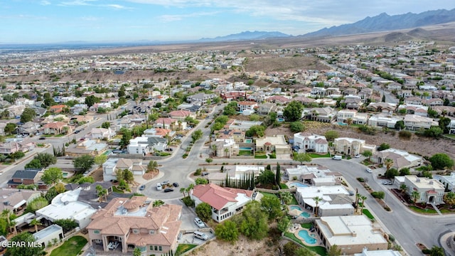 6528 Calle Placido Dr, El Paso, TX 79912 - aerial overview of property's location featuring nearby suburban area and a mountain backdrop