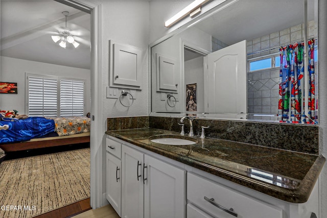 6528 Calle Placido Dr, El Paso, TX 79912 - bathroom with vanity, a ceiling fan, a shower with shower curtain, and ensuite bathroom