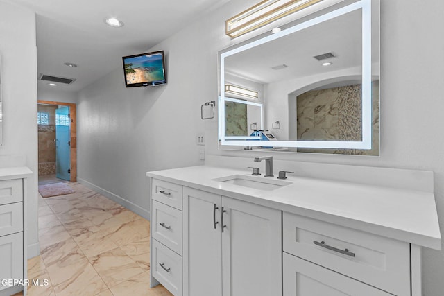6528 Calle Placido Dr, El Paso, TX 79912 - full bathroom with vanity, marble look tile flooring, plenty of natural light, and recessed lighting