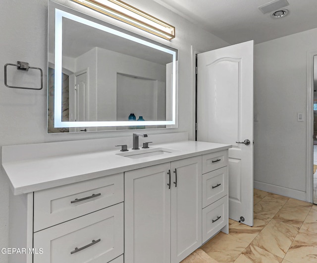 6528 Calle Placido Dr, El Paso, TX 79912 - bathroom featuring marble finish floors and vanity
