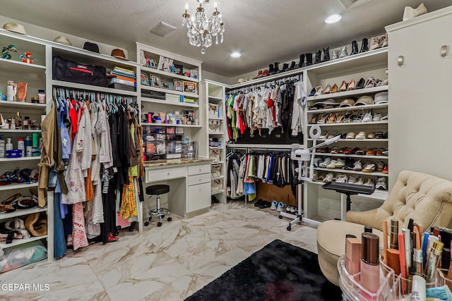 6528 Calle Placido Dr, El Paso, TX 79912 - spacious closet featuring marble finish flooring