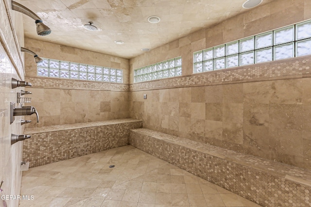 6528 Calle Placido Dr, El Paso, TX 79912 - full bath featuring tile walls, a tile shower, and tile patterned flooring