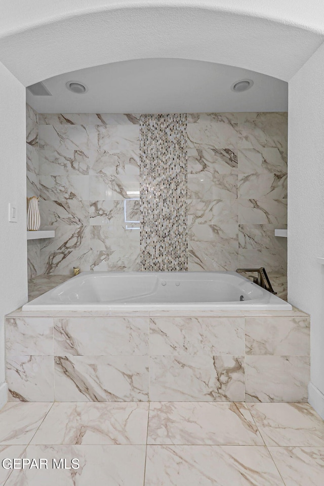 6528 Calle Placido Dr, El Paso, TX 79912 - bathroom with marble finish flooring and a tub with marble appearance
