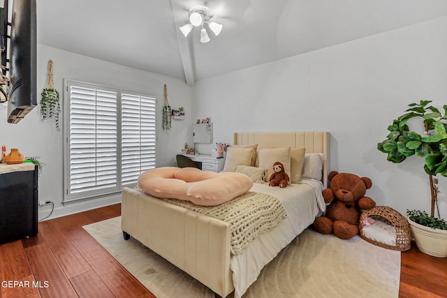 6528 Calle Placido Dr, El Paso, TX 79912 - bedroom featuring lofted ceiling, wood finished floors, and a ceiling fan
