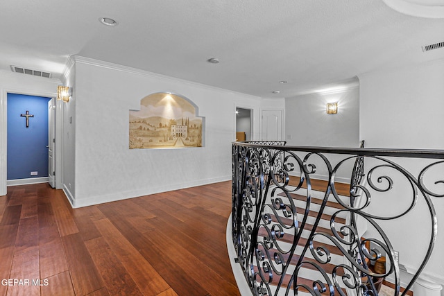 6528 Calle Placido Dr, El Paso, TX 79912 - hall with an upstairs landing, wood finished floors, and ornamental molding