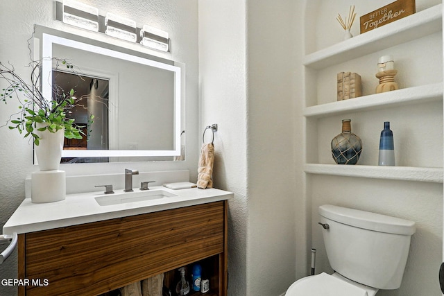 6528 Calle Placido Dr, El Paso, TX 79912 - bathroom with vanity and a textured wall