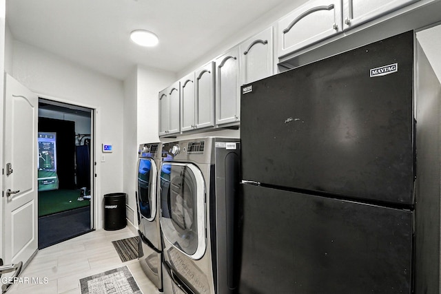 6528 Calle Placido Dr, El Paso, TX 79912 - laundry room featuring separate washer and dryer and cabinet space