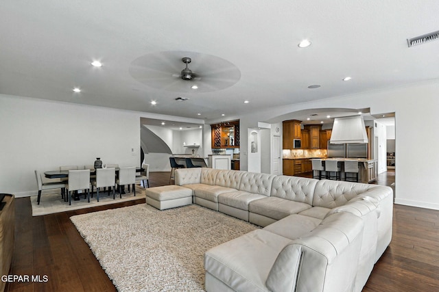 6528 Calle Placido Dr, El Paso, TX 79912 - living room featuring a ceiling fan, dark wood finished floors, recessed lighting, and arched walkways