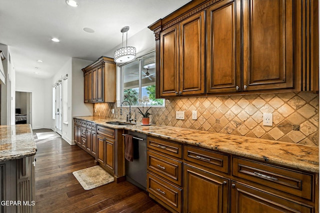 6528 Calle Placido Dr, El Paso, TX 79912 - kitchen featuring stainless steel dishwasher, dark wood-style flooring, tasteful backsplash, light stone counters, and recessed lighting
