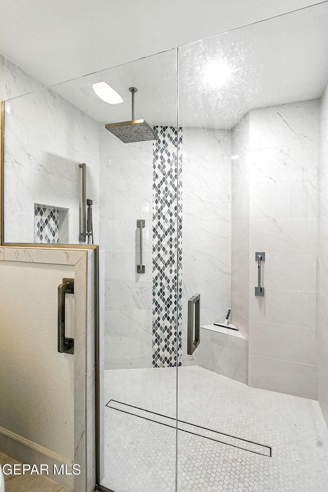 6528 Calle Placido Dr, El Paso, TX 79912 - bathroom featuring a marble finish shower