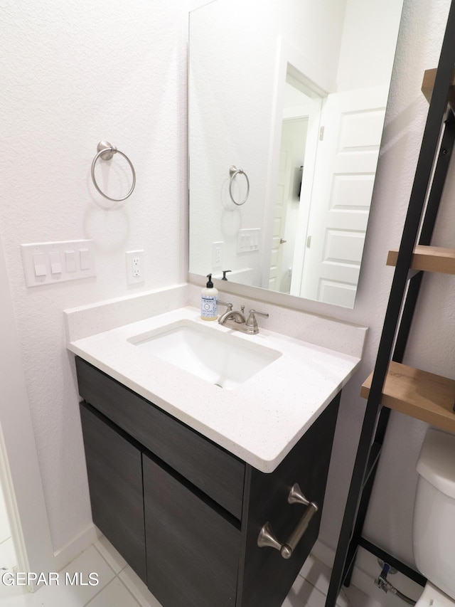 480 Deserts Dr, Socorro, TX 79927 - half bath with vanity and tile patterned floors