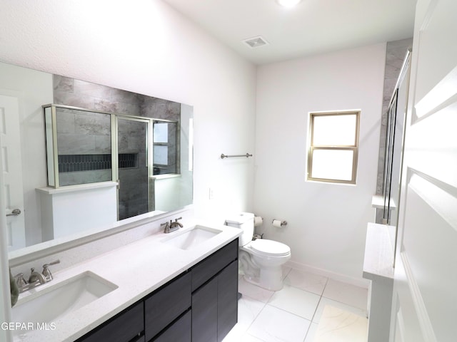 480 Deserts Dr, Socorro, TX 79927 - bathroom with a stall shower, marble look tiles, and double vanity