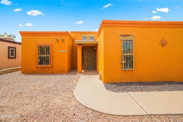 11852 Pete Rose Dr, El Paso, TX 79936 - view of front of house with stucco siding