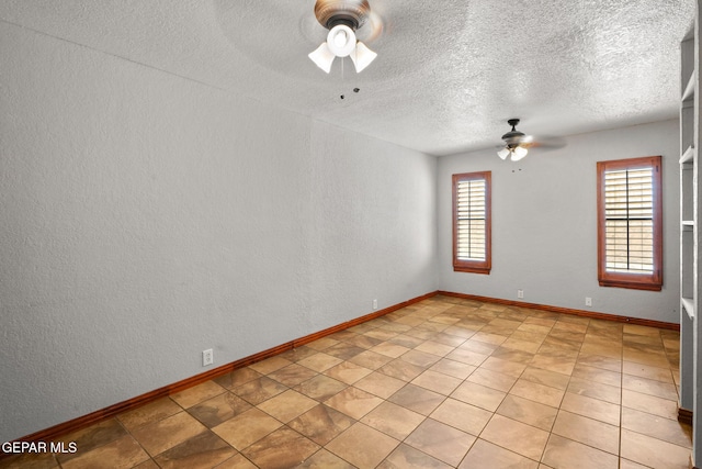 11852 Pete Rose Dr, El Paso, TX 79936 - spare room with a ceiling fan, a textured ceiling, and a textured wall