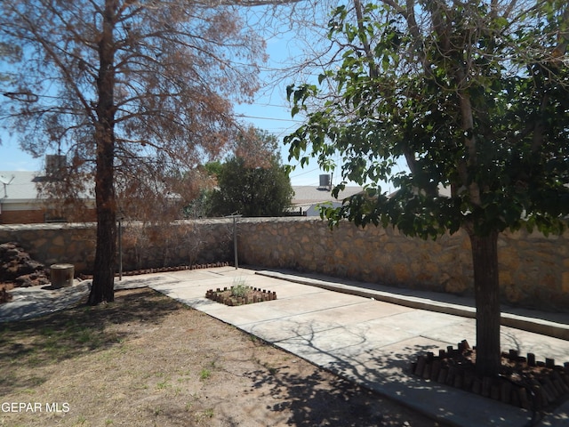 5325 Fairbanks Dr, El Paso, TX 79924 - fenced backyard with a patio area