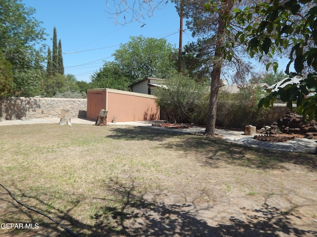 5325 Fairbanks Dr, El Paso, TX 79924 - view of green lawn with an outdoor structure