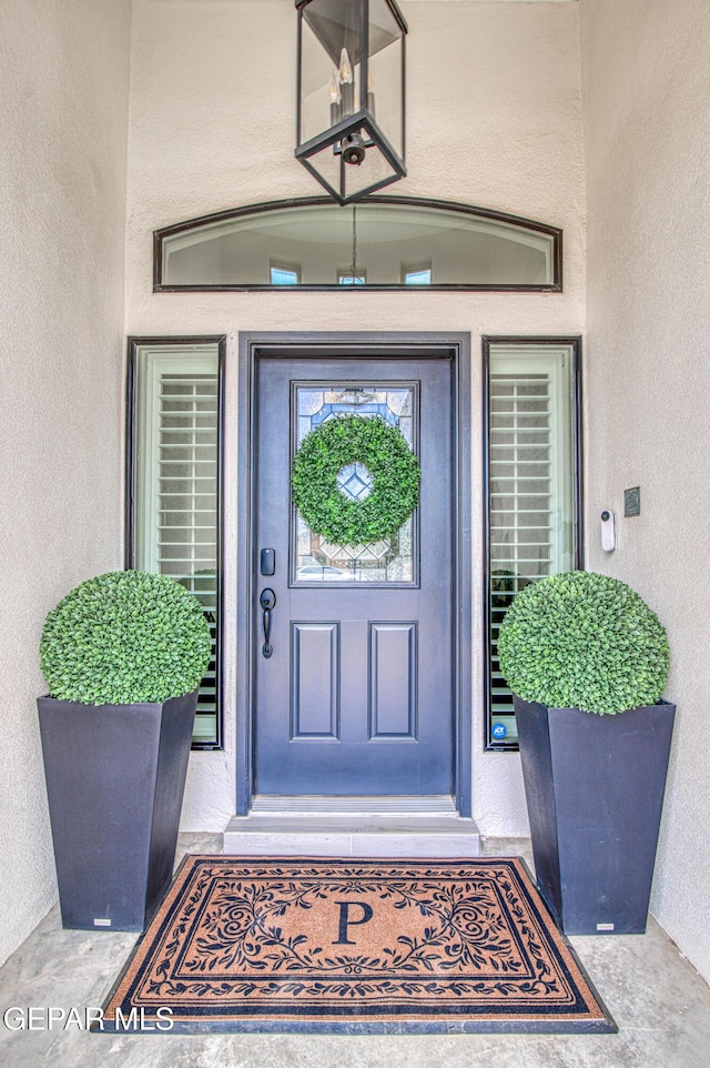 5705 Valley Lilac Ln, El Paso, TX 79932 - doorway to property featuring stucco siding