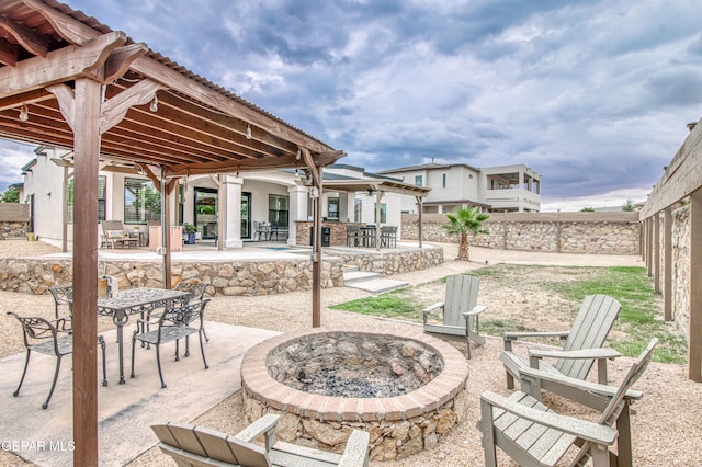 5705 Valley Lilac Ln, El Paso, TX 79932 - view of patio / terrace with an outdoor fire pit and outdoor dining area