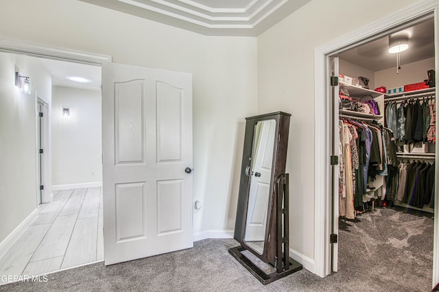 5705 Valley Lilac Ln, El Paso, TX 79932 - unfurnished bedroom featuring a walk in closet, a closet, and carpet floors